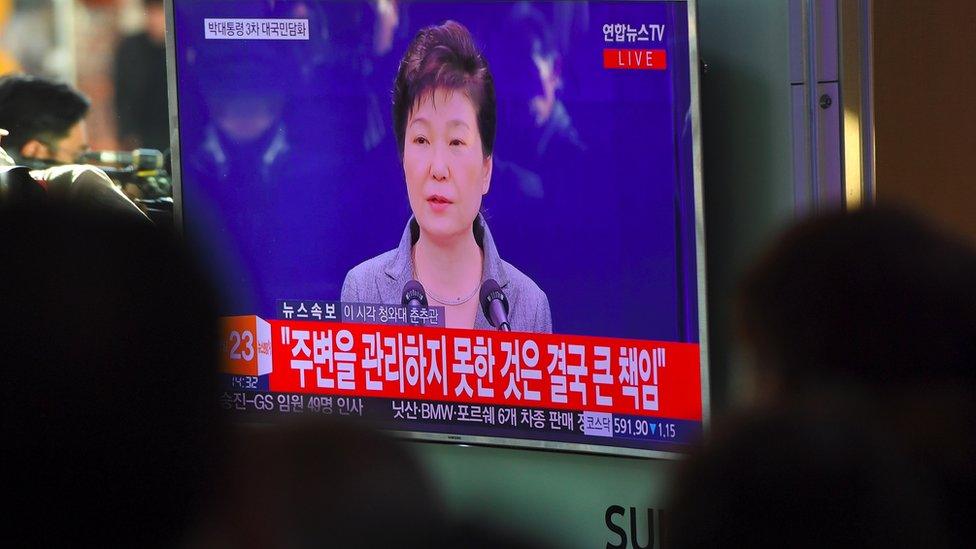 President Park Geun-hye seen on a public TV screen