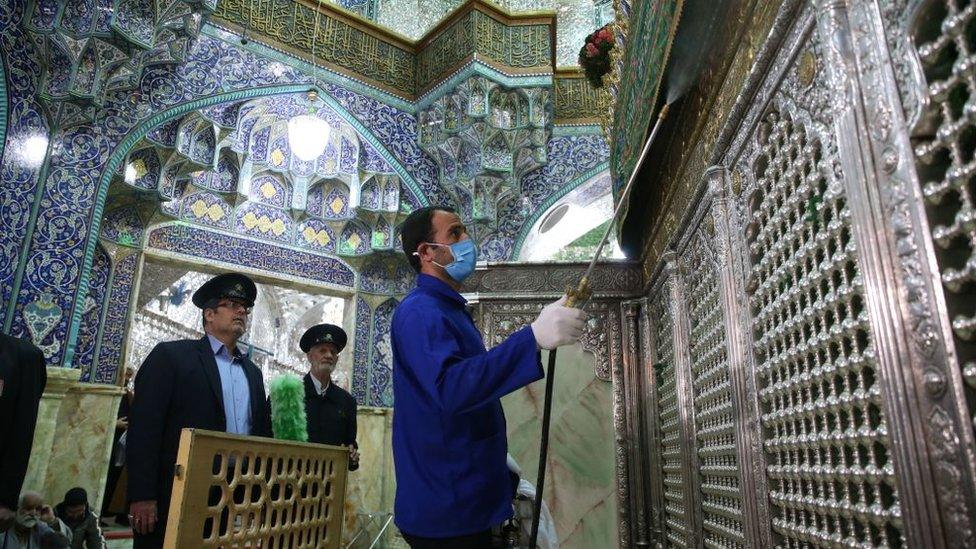 Iranian sanitary workers disinfect Qom's Masumeh shrine