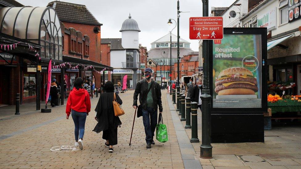 Shoppers in Oldham