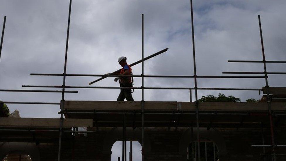 Builder on construction site