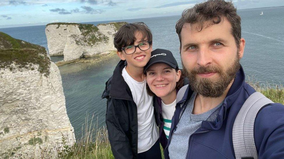 Nataliia with her son and husband in Dorset