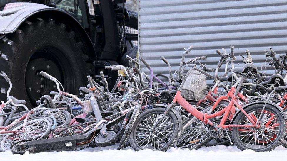 Abandoned bicycles are pictured at the international border crossing at Salla,