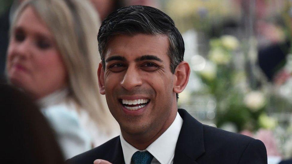 Rishi Sunak laughing