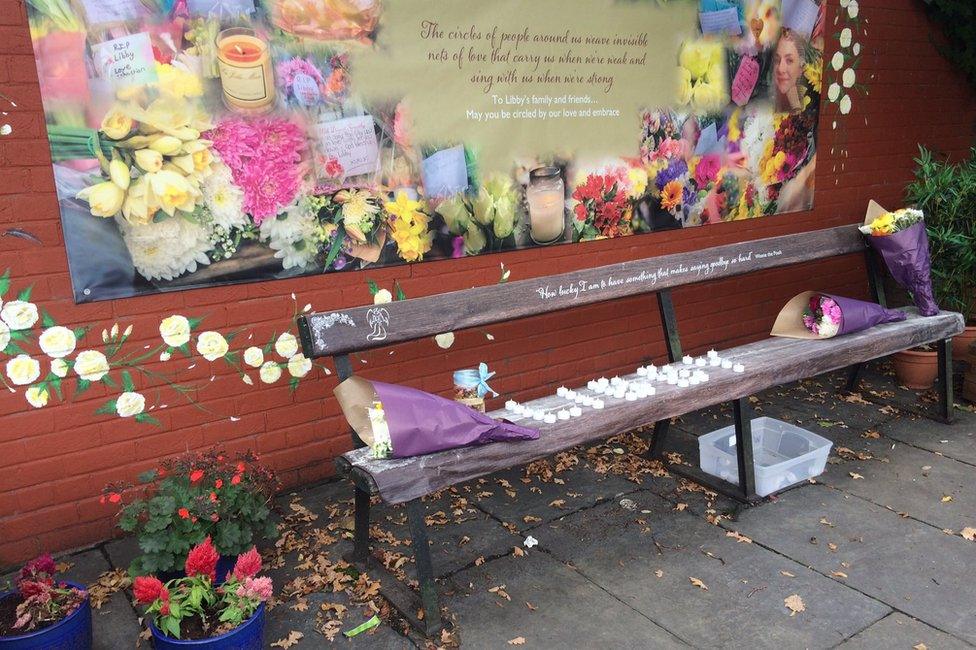 Bench with flowers and tea lights