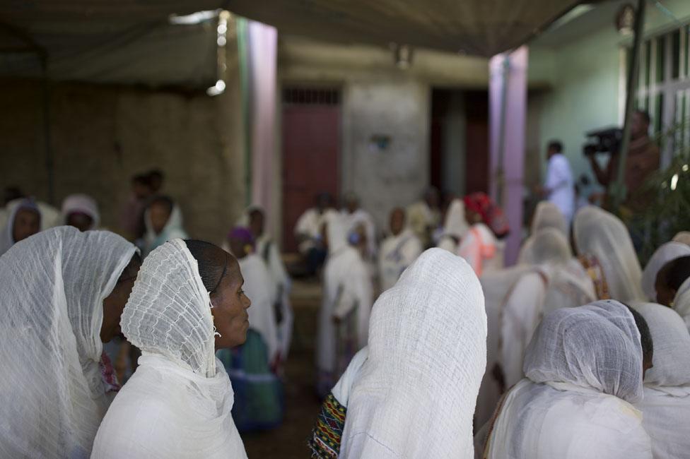 Women at a baptism