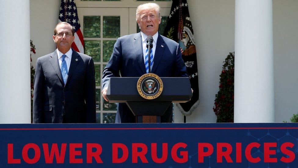 Health and Human Services Secretary Alex Azar listens as U.S. President Donald Trump delivers a speech about lowering prescription drug prices, from the Rose Garden at the White House in Washington, U.S., May 11, 2018.