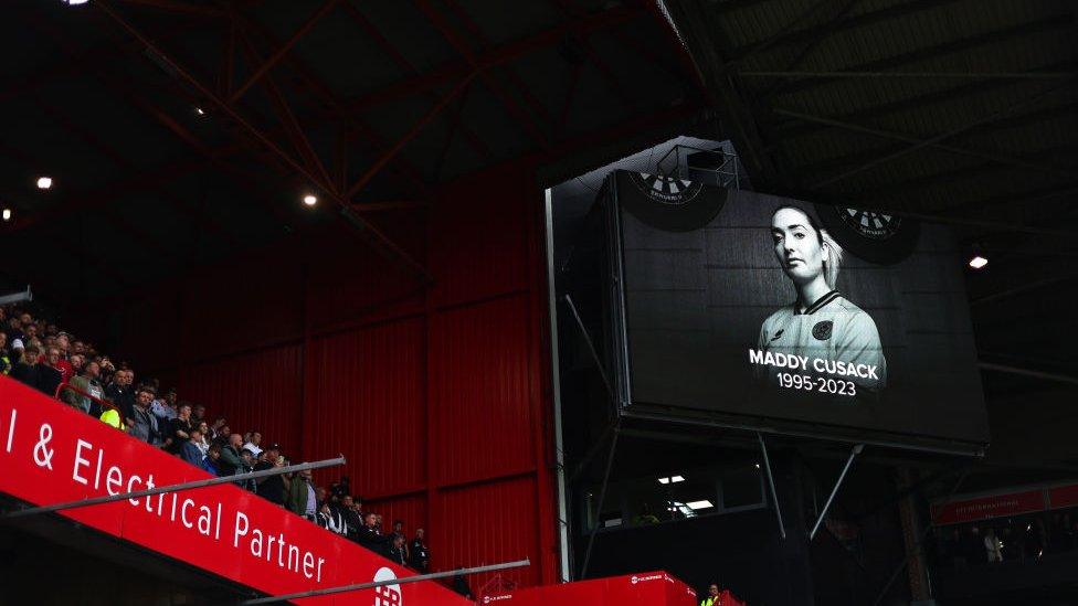 A tribute to a Maddy Cusack at a screen at Bramall Lane