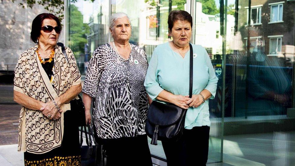 Three women from the group of victims' relatives, the Mothers of Srebrenica, arrive at the Dutch supreme court on 19 July 2019