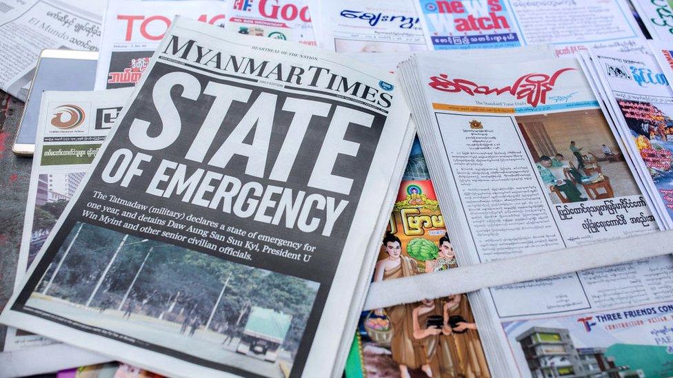 Myanmar Times newspaper with the headline 'State of Emergency' among other newspapers for sale are seen on display a day after Myanmar's army detained the country's de facto leader Aung San Suu Kyi and the country's president in a coup. February 2021