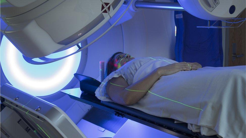 Woman receiving radiotherapy