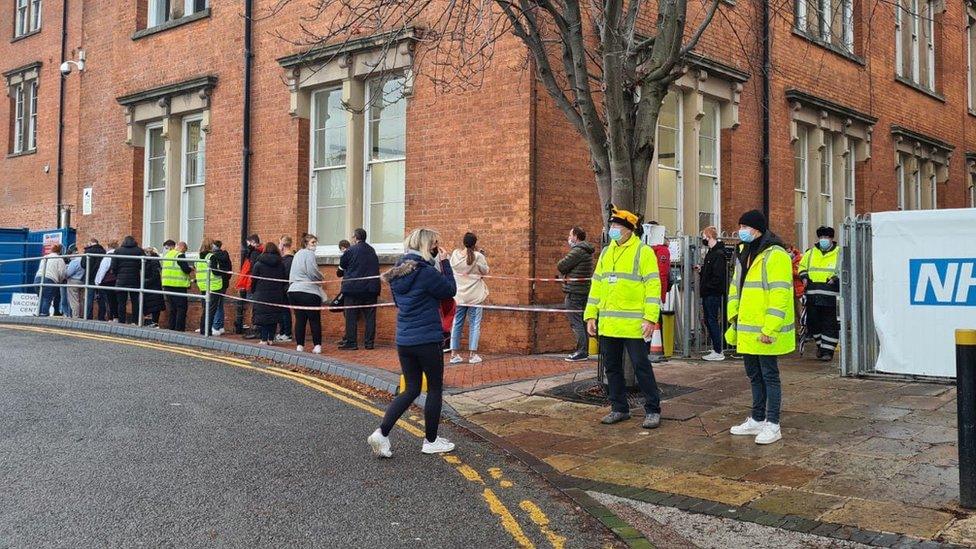 Vaccination centre queues