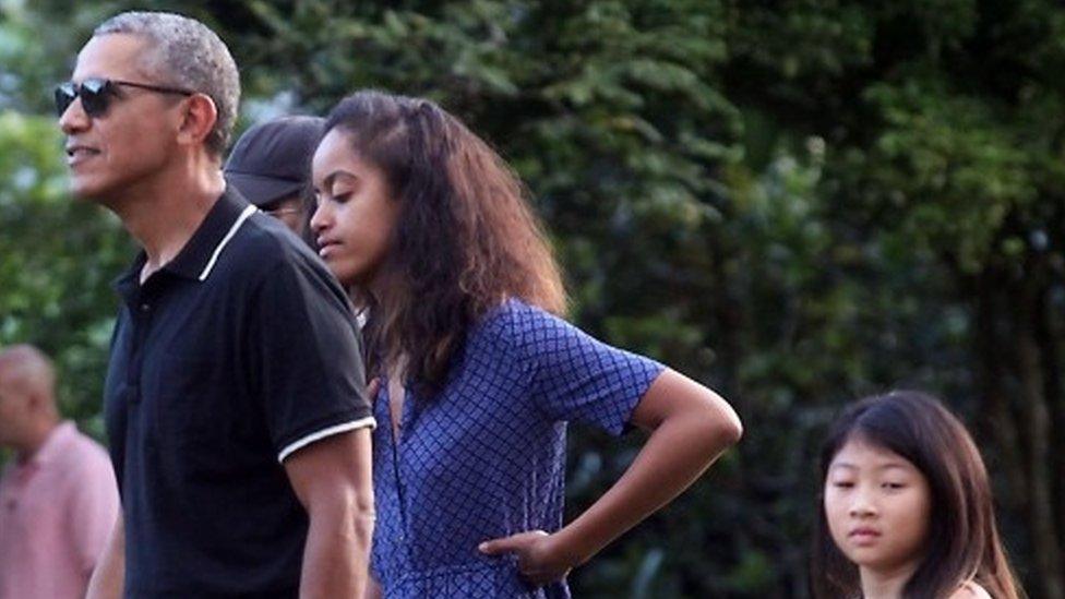 Former US president Barack Obama (left) with his daughter Malia Obama (centre) visit the Borobudur Temple in Magelang, Central Java (28 June 2917)