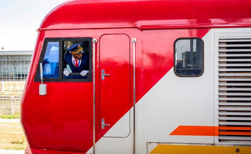 Train with a driver looking out of the window