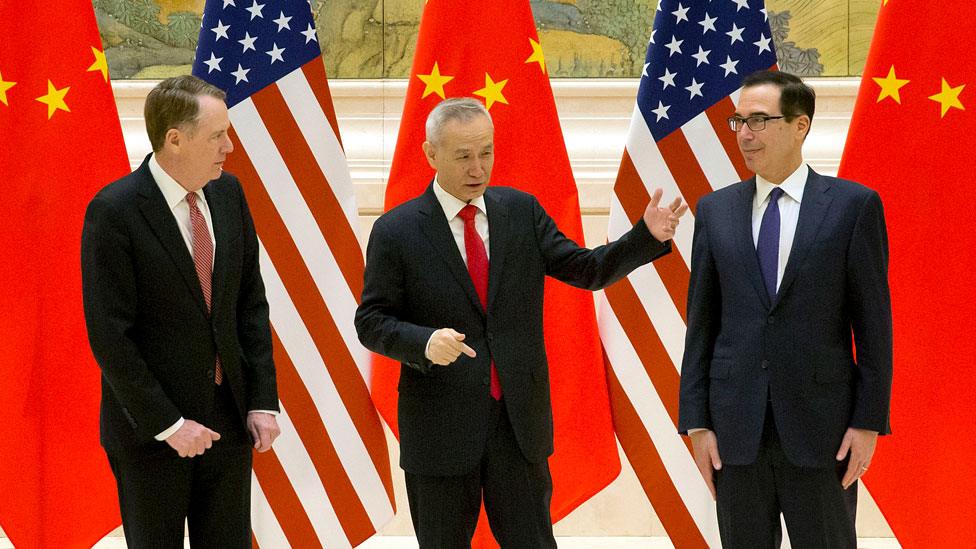 (From L) US Trade Representative Robert Lighthizer, Chinese Vice Premier and lead trade negotiator Liu He and US Treasury Secretary Steven Mnuchin talk before the opening session of trade negotiations at the Diaoyutai State Guesthouse in Beijing on February 14, 2019