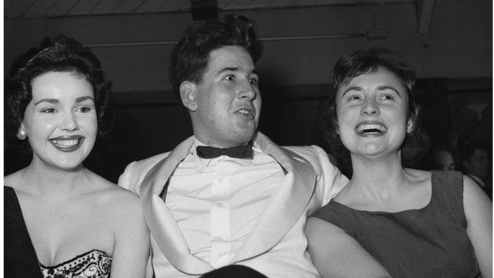 Lord Anthony Moynihan pictured with two women in 1957