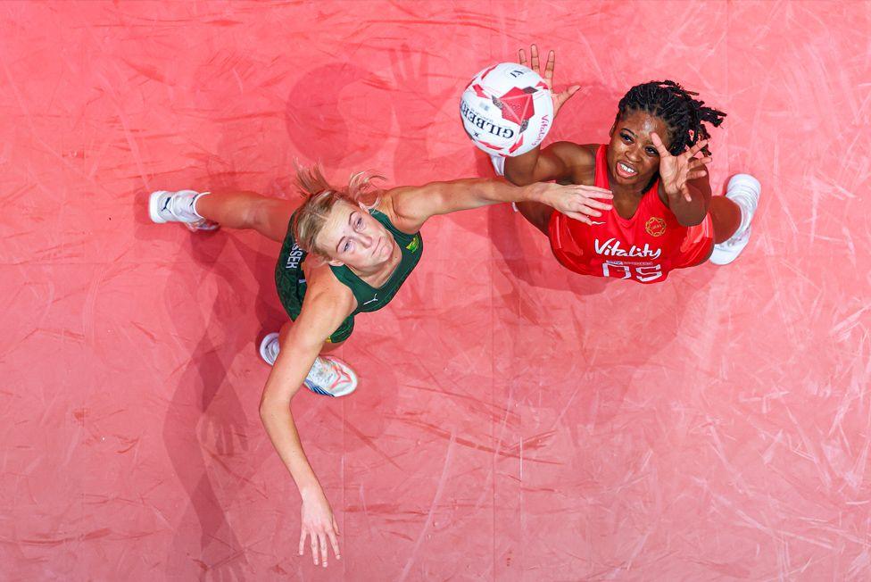 Olivia Tchine of England battles with Sanmarie Visser of South Africa during the Netball Nations Cup match at Motorpoint Arena, Nottingham