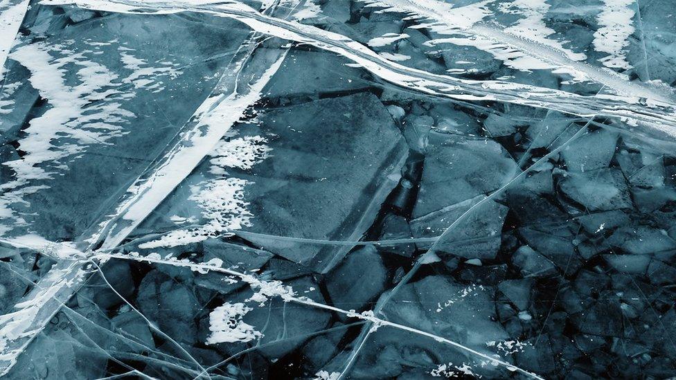 View of blocks of ice submerged in the lake