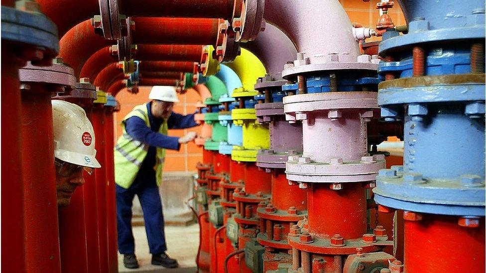 EDF employees John Wilkinson (L) and Alan Green (R) next to turbine fire protection at EDF central electrique of West Burton