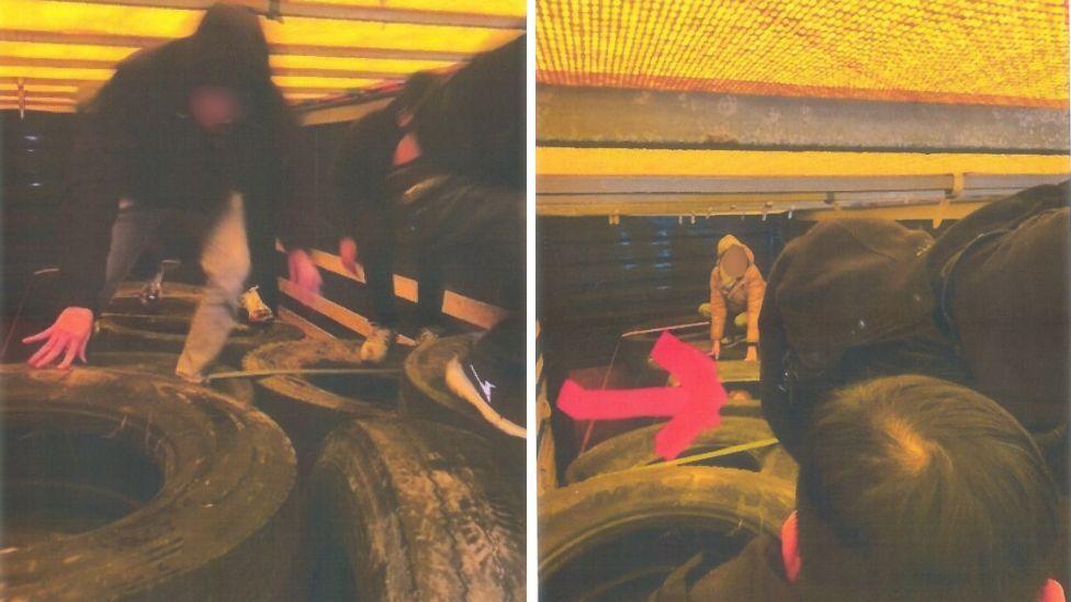 Images of blurred out faces crawling over big black tyres inside a lorry. You cannot identify the people but some are moving so quickly their legs and arms are blurring in the image.