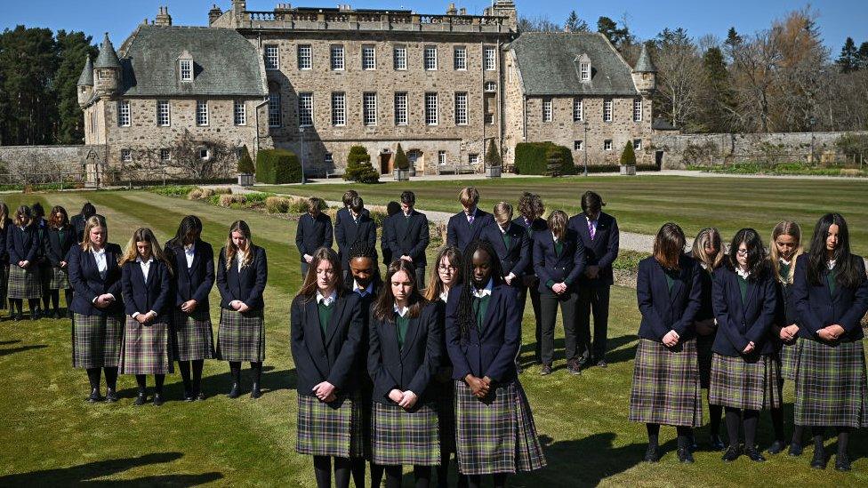 Pupils gather at Gordonstoun to observe the minute's silence for Prince Philip