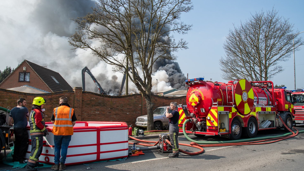 Fire crews at scrapyard fire