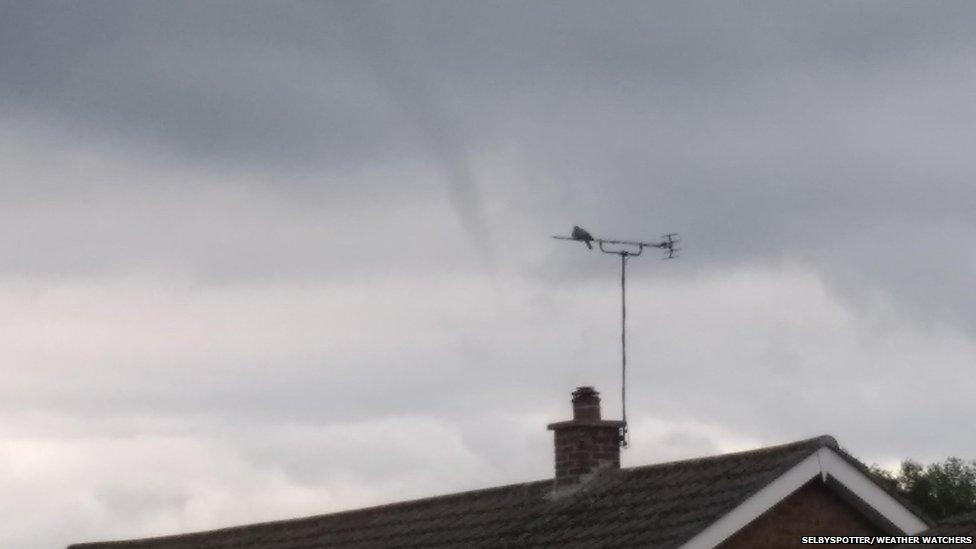 Funnel shaped cloud in the sky