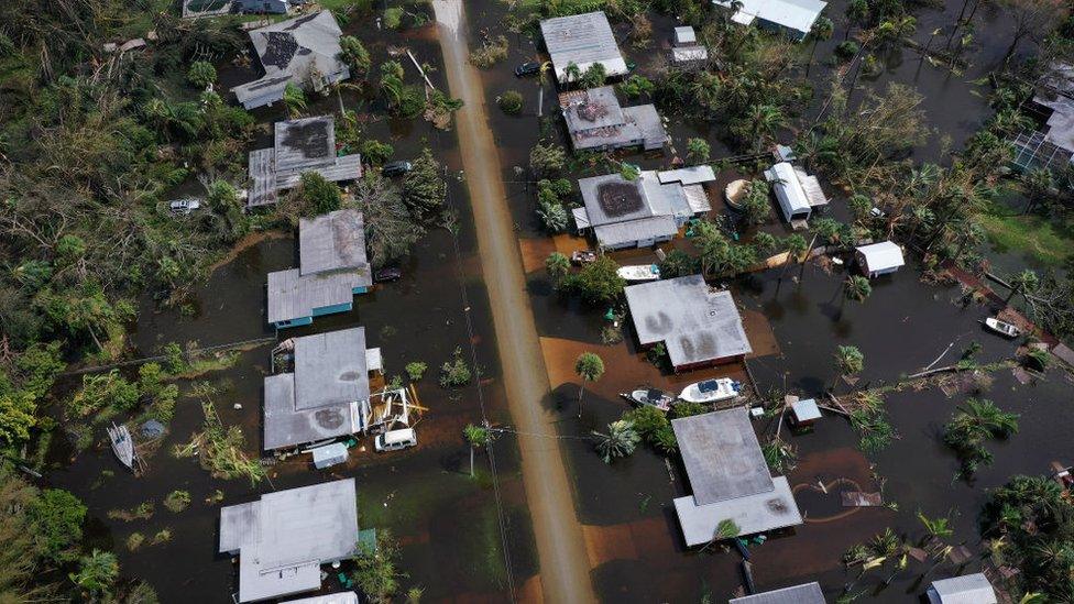 An aerial shot of a neighbourhood flooded after Hurricane Ian moved through.