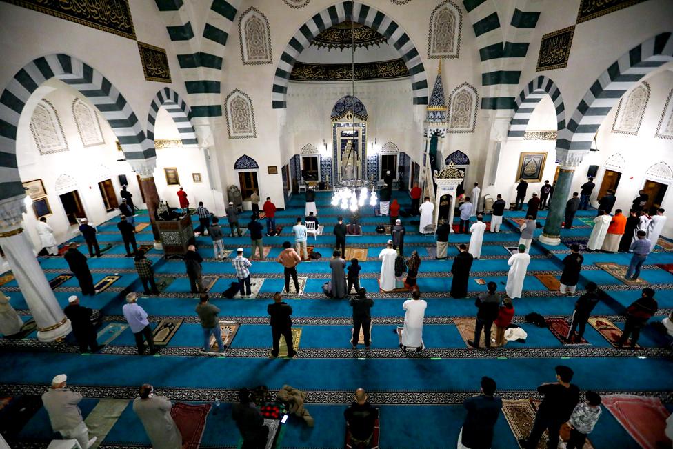 Worshippers praying in a mosque