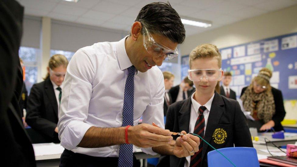 Prime Minister Rishi Sunak visits a chemistry class at Erasmus Darwin Academy on November 21, 2022 in Burntwood, England.