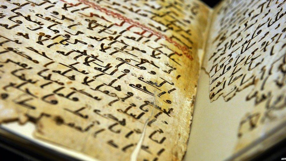 A Koran manuscript believed to date back to the 7th Century on display at the University of Birmingham, 22 July 2015 (AFP)