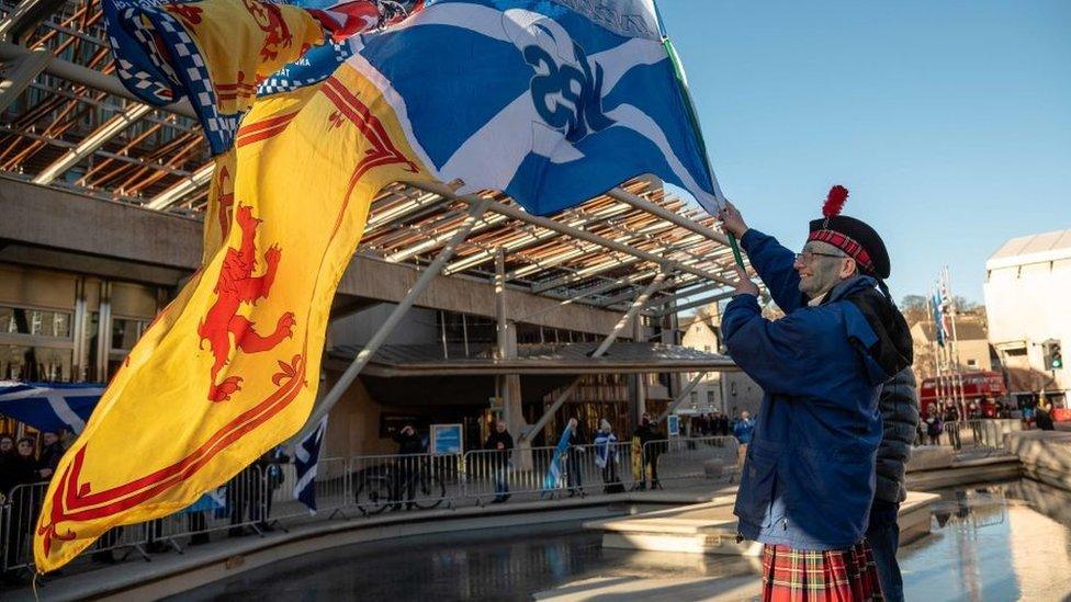 Independence supporter outside Scottish Parliament