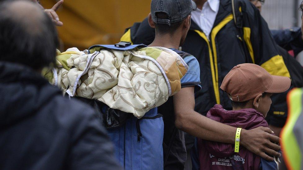 Migrants arrive at Munich train station