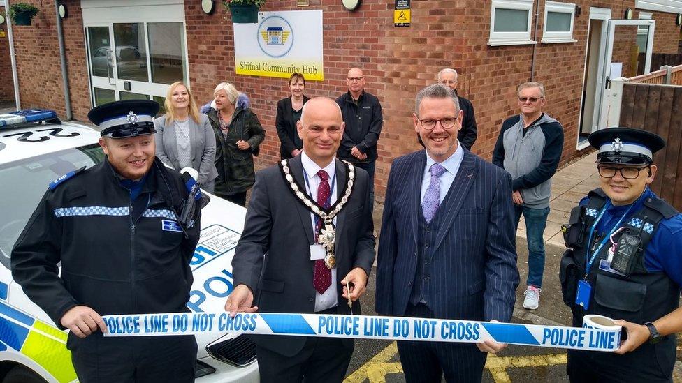 PCC John Campion and Shifnal Town Council mayor Roger Cox with officers outside Shifnal station