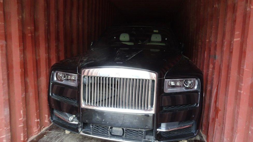 Rolls Royce in a shipping container