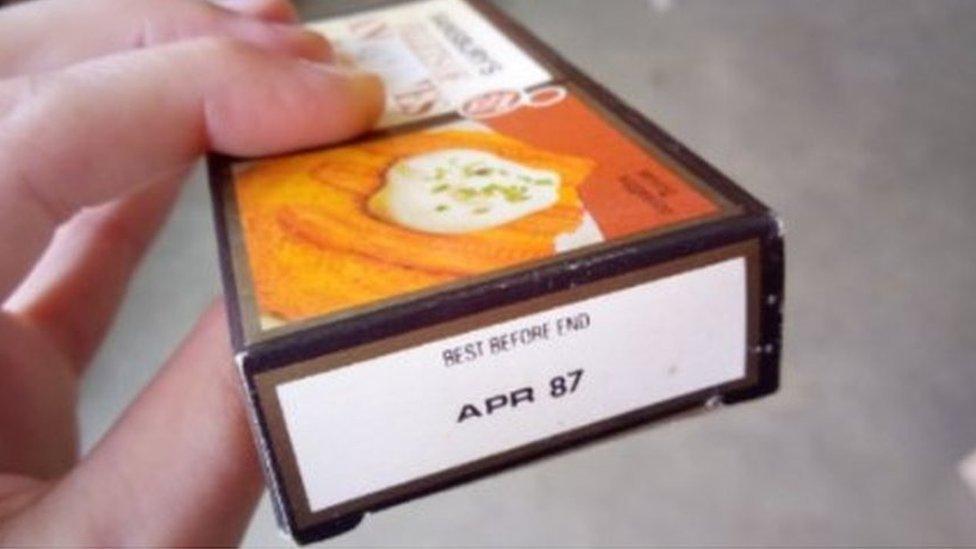 Boxed tin of anchovies with best before date of April 1987