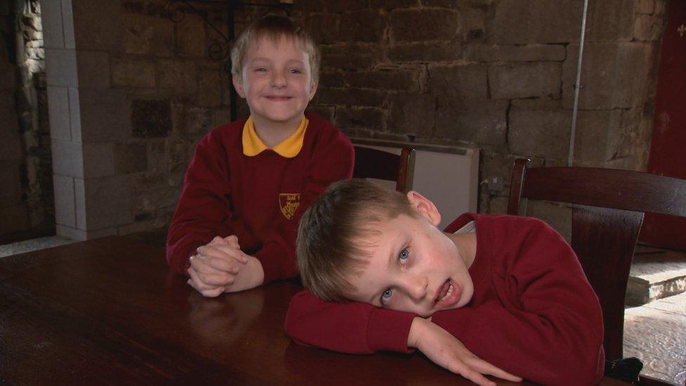 Ukrainian children living in the castle