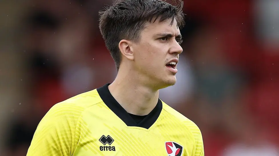 Barnet signed goalkeeper Owen Evans on a permanent deal after release from Cheltenham Town