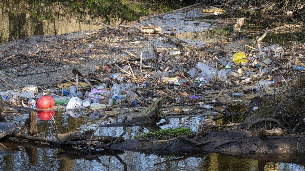 Pollution in a river in Stockport