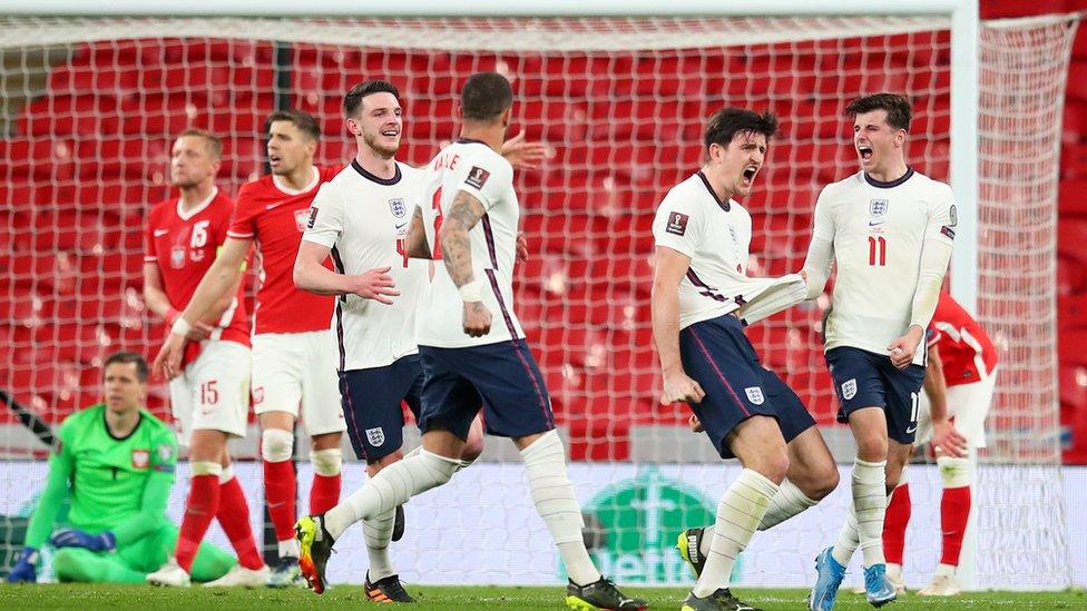 England celebrate goal against Poland.