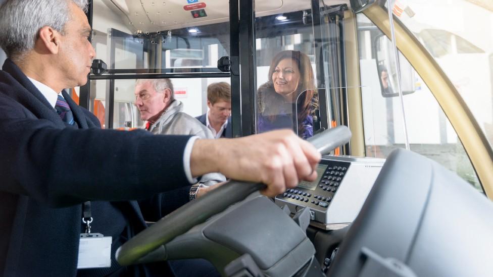 Bus driver and passengers