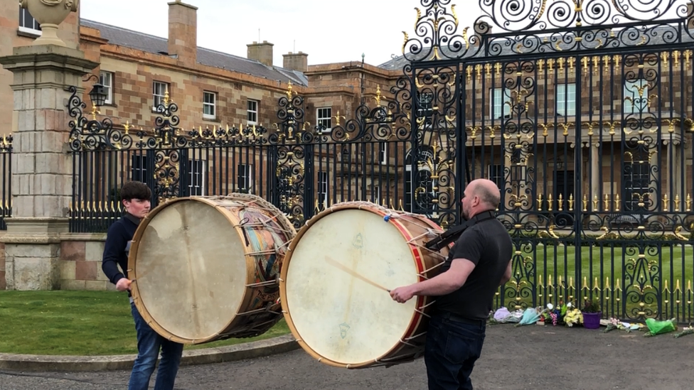 Lambeg drums are played outside Hillsborough Castle