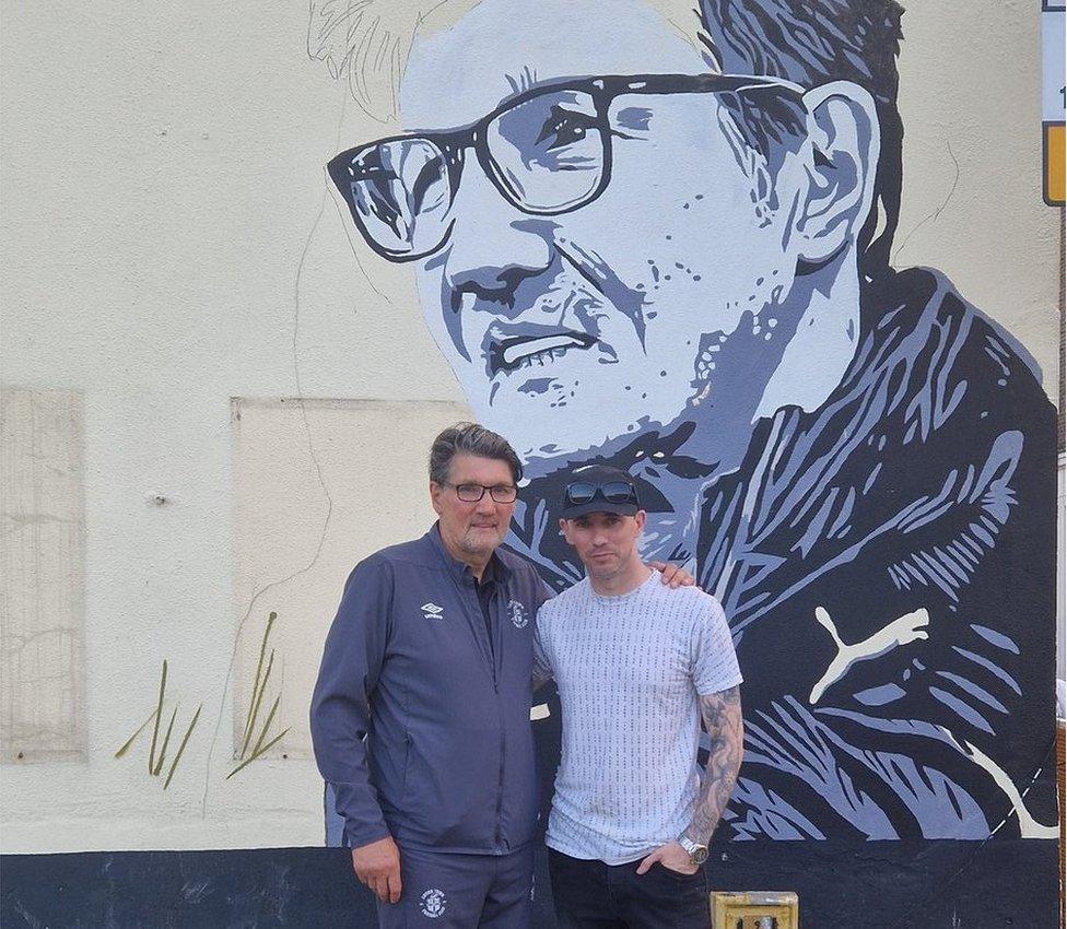 Mick Harford with Jayson Swift and the mural