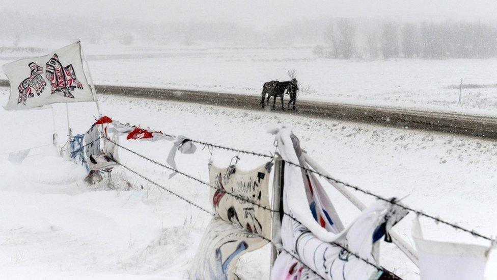 protester in snow storm