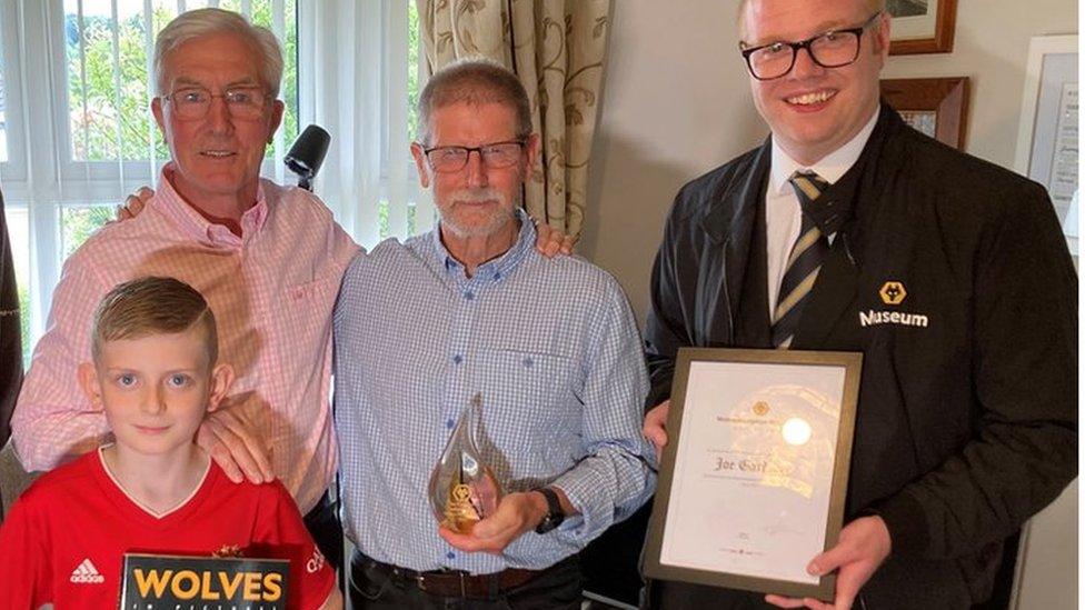 Left to right: John Richards (Chairman of Hall of Fame committee), Jamie Gardiner (front), John Gardiner, Pete Crump (Wolves Museum)