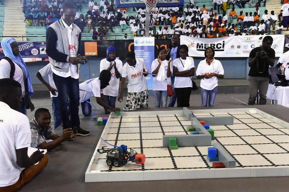 A robot performs during the final of the national robotics competition at the Marius Ndaye stadium in the Senegalese capital Dakar.