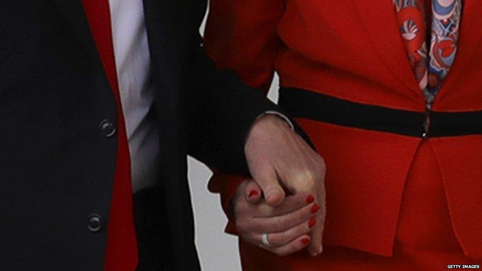 Trump and May hold hands