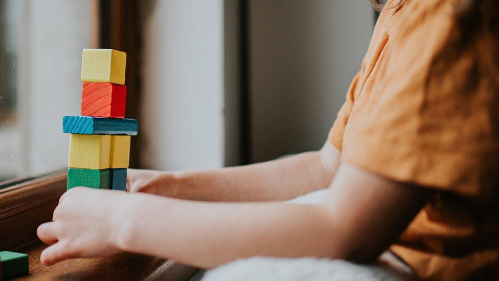 child with blocks