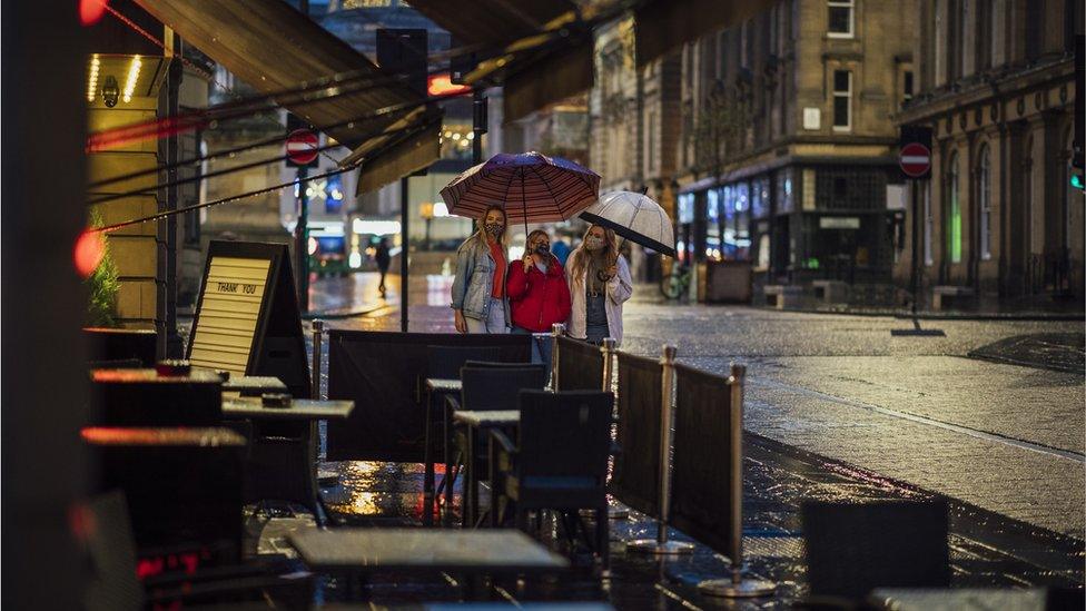 Group of women walk in Newcastle after dark