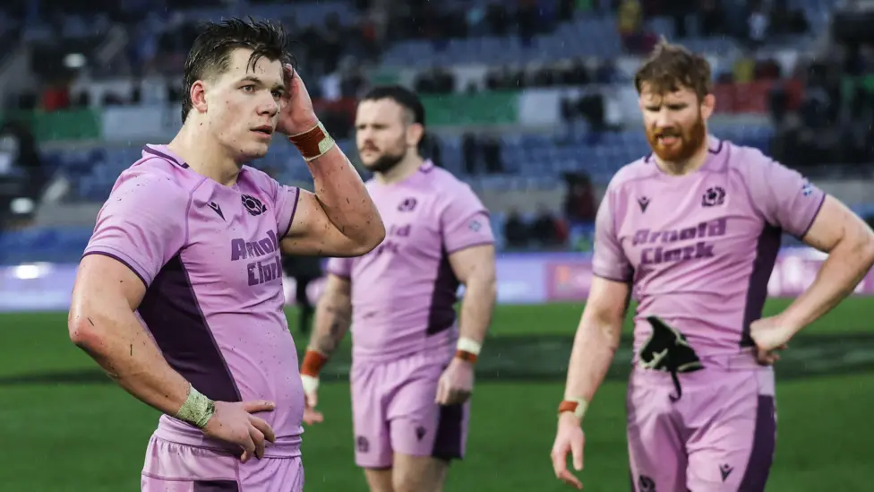 Huw Jones looks dejected after Scotland's Six Nations defeat by Italy in Rome