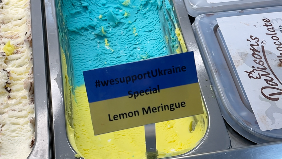 Blue and yellow ice cream in parlour tray